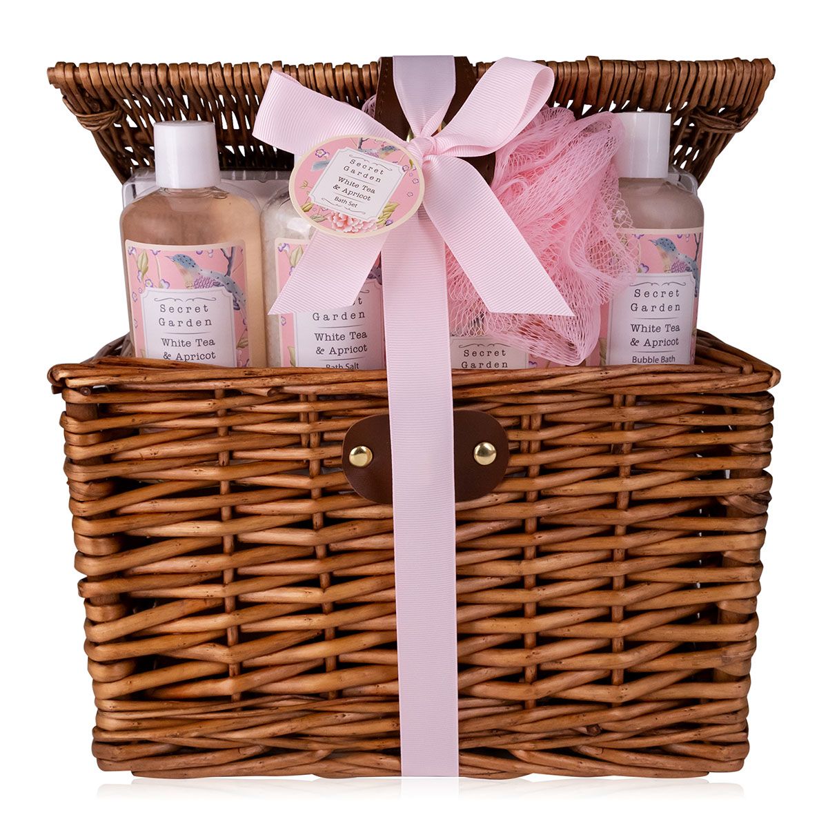 Geschenkset im Weidenkorb. Enthält Flaschen, Badeschwamm und Schleife. Aufschrift: Secret Garden, White Tea & Apricot.