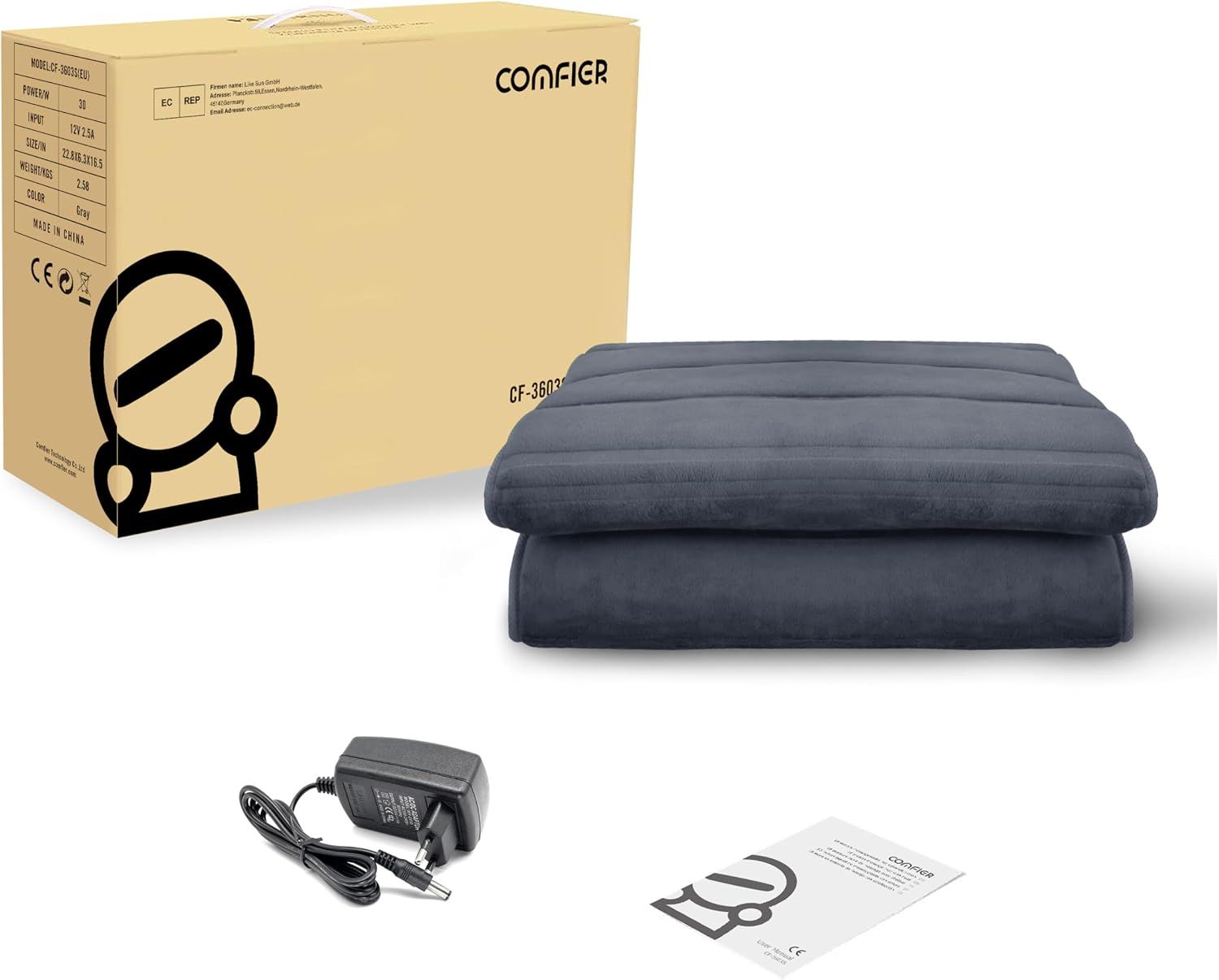 Massageauflage mit Netzteil und Bedienungsanleitung in der Verpackung.