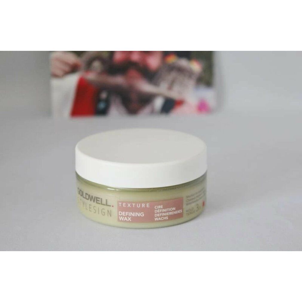 Goldwell Stylesign Texture Definierendes Wachs. Dose mit weißem Deckel. Produktbezeichnung und Informationen auf der Dose.