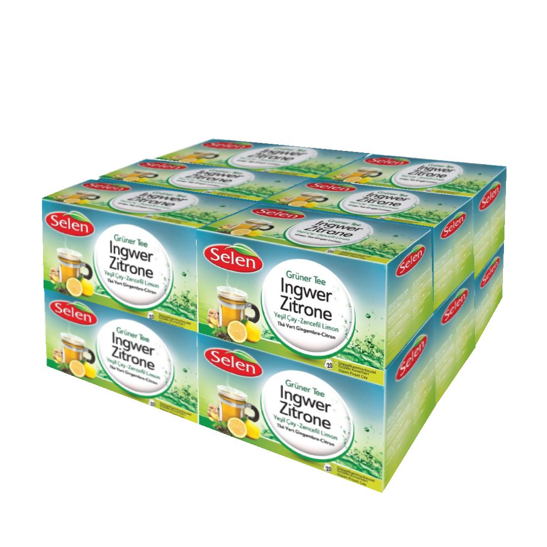 Mehrere Kartons mit SELEN Grüner Tee Ingwer-Zitrone. Aufdruck mit Produktname, Abbildung von Tee mit Zitrone und Ingwer.