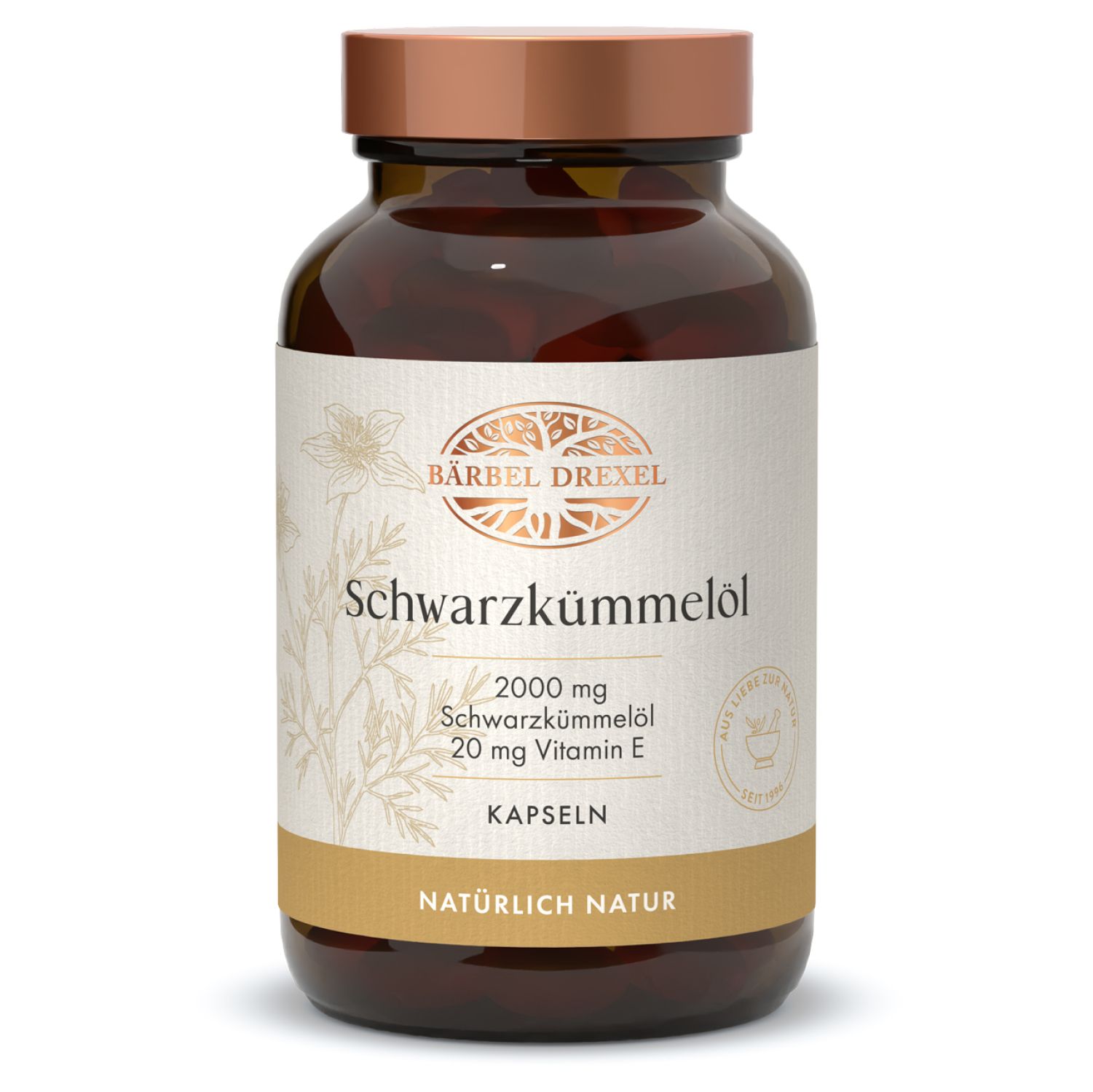 Braune Glasflasche mit Kapseln. Aufschrift: Bärbel Drexel Schwarzkümmelöl, 2000 mg, 20 mg Vitamin E. Kapseln.