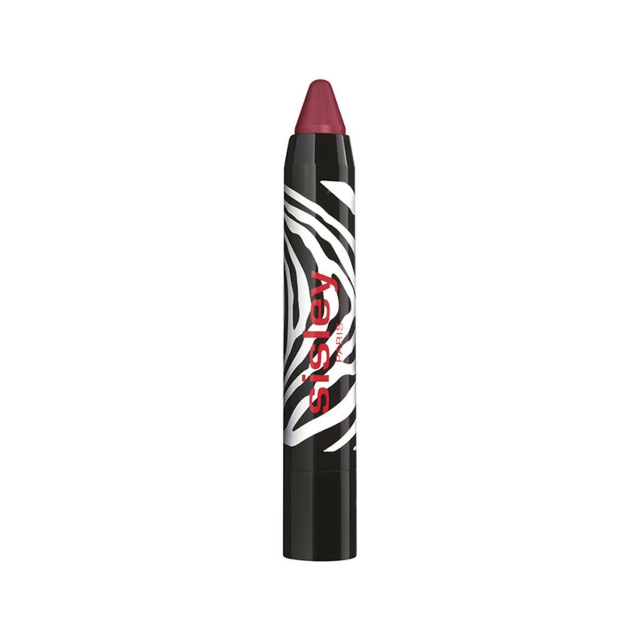 Lippenstiftstift mit Zebra-Muster. Schwarzer Stift mit weißem Zebra-Muster und rotem Lippenstift. Marke Sisley.