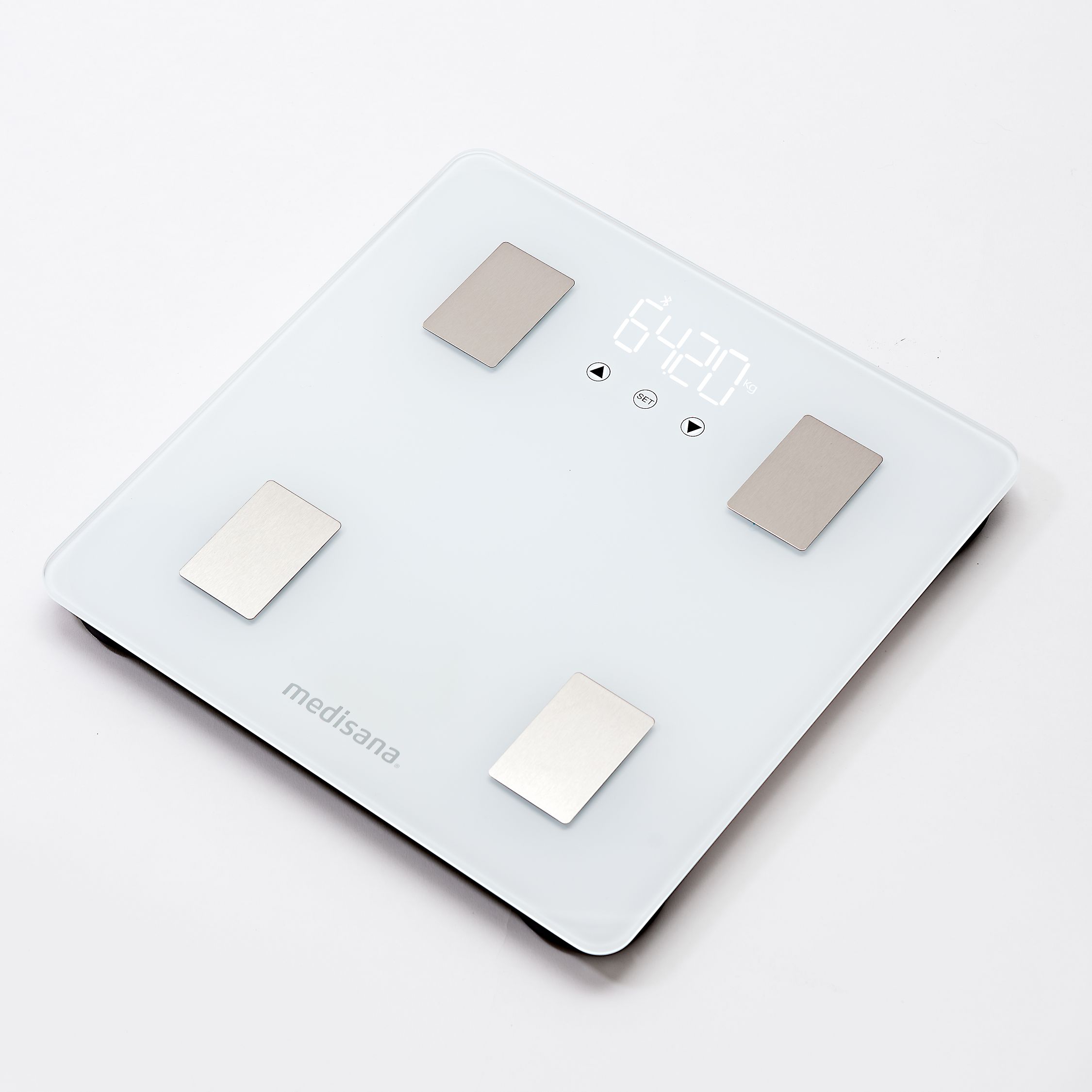 Witte lichaamsanalyse weegschaal met digitaal display. Vier meetvlakken, logo 'medisana'.