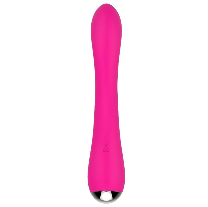 Pinkfarbener Vibrator mit länglicher Form. Am unteren Ende befindet sich eine silberne Kugel. DC-Symbol sichtbar.