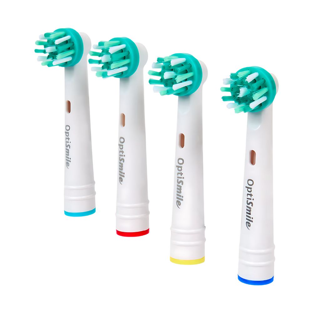 Vier OptiSmile X Active Aufsteckbürsten mit grünen Borsten. Blaue, rote, gelbe und blaue farbige Ringe am Bürstenfuß.