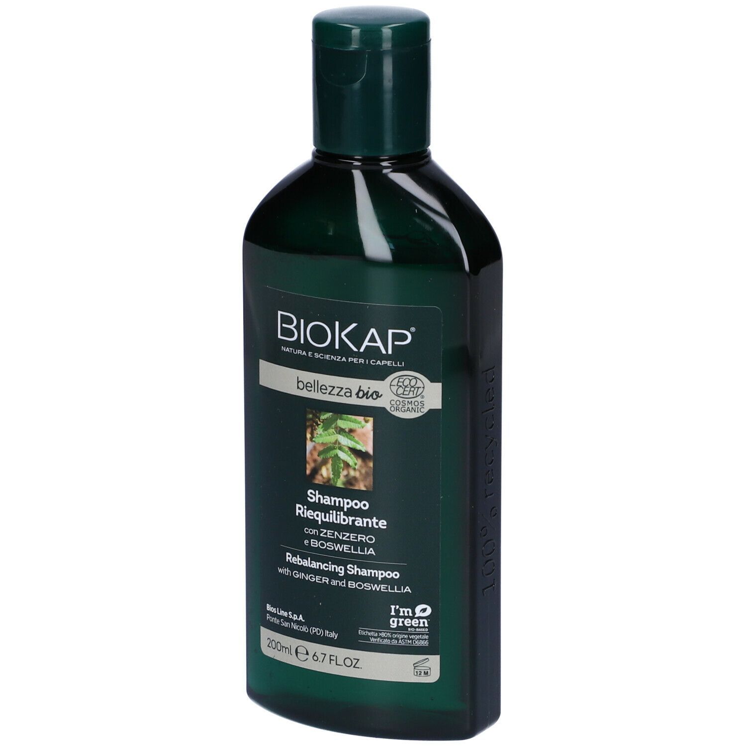 Dunkelgrüne Flasche Biokap Bellezza Bio Rebalancing Shampoo mit Bild von Blättern und Text.