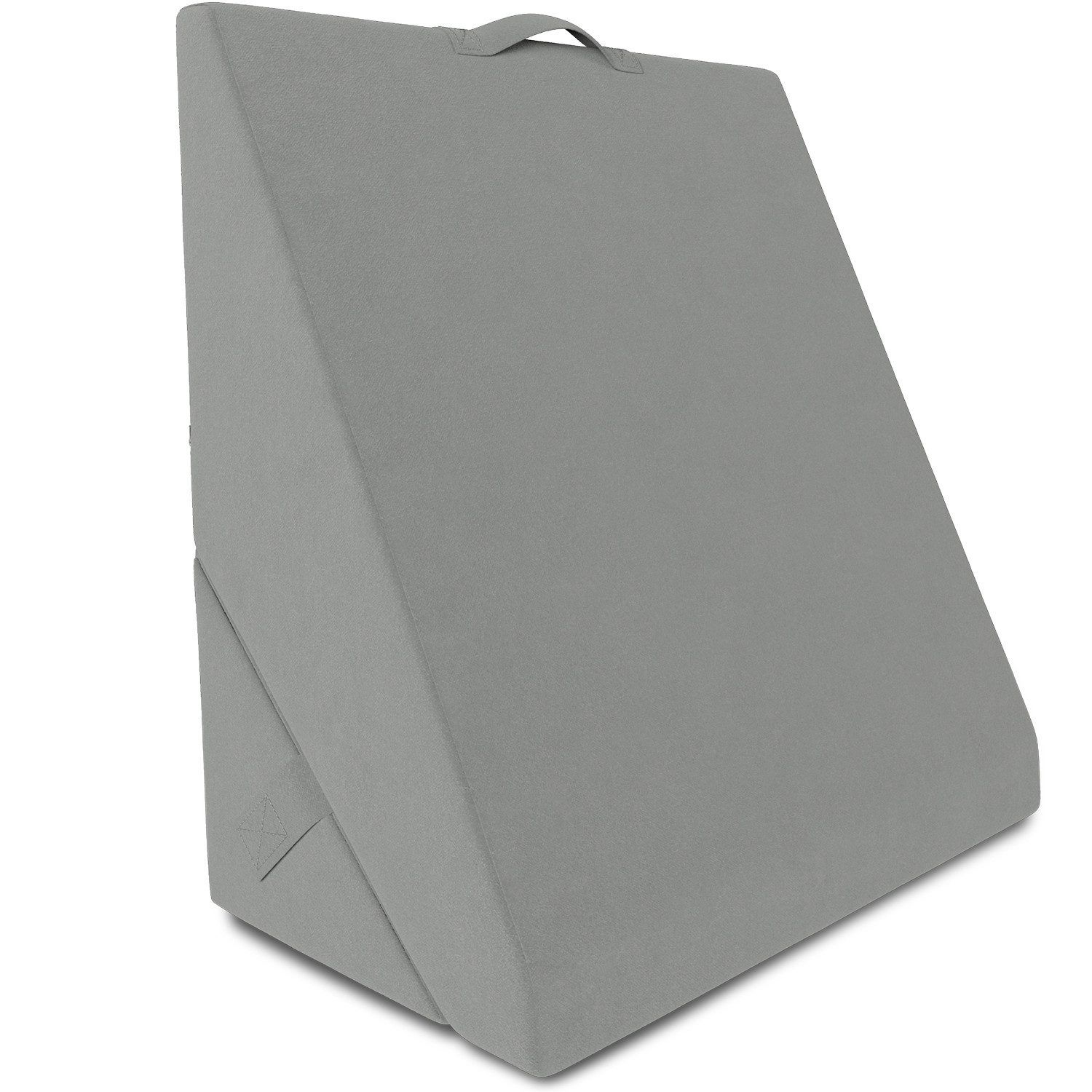Graues Keilkissen mit Tragegriff. Geformt für eine erhöhte Position. Stoffbezug.