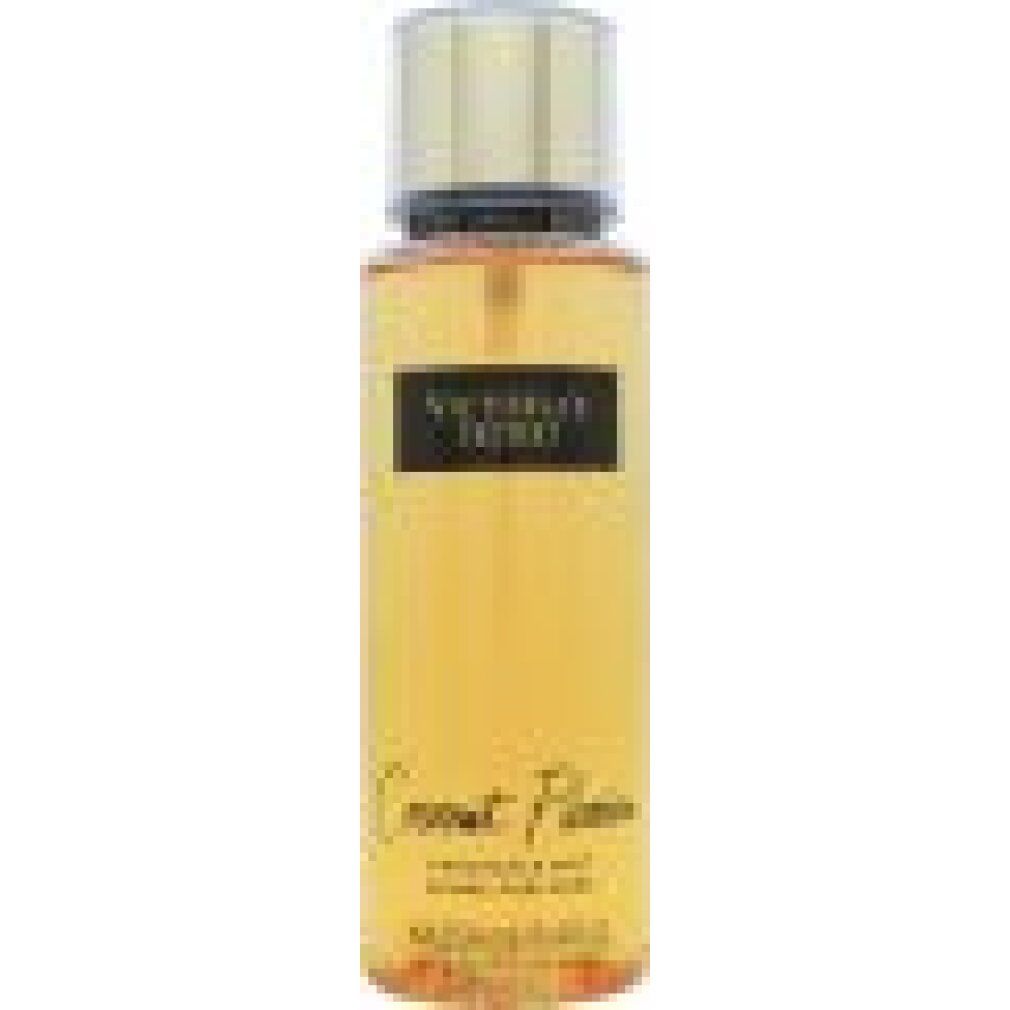 Körperspray-Flasche mit goldfarbenem Deckel. Schwarzes Etikett mit Produktnamen und Marke. Gelbliche Flüssigkeit.