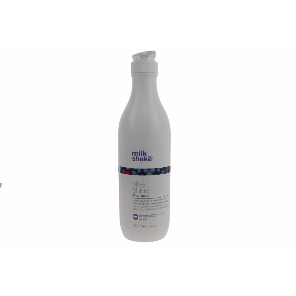 Weiße Flasche mit Pumpverschluss. Aufschrift: milk_shake, Silver Shine Shampoo. Produkt für blondes oder graues Haar.