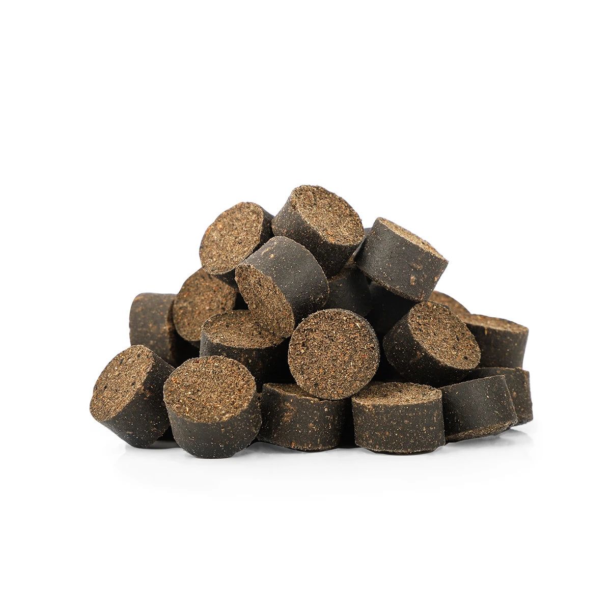 Haufen Tabletten. Braune, runde Tabletten mit sichtbarer Struktur.