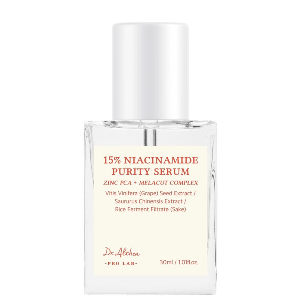 Dr. Althea 15% Niacinamide Purity Serum in einem rechteckigen Glasflakon mit weißem Pumpspender.