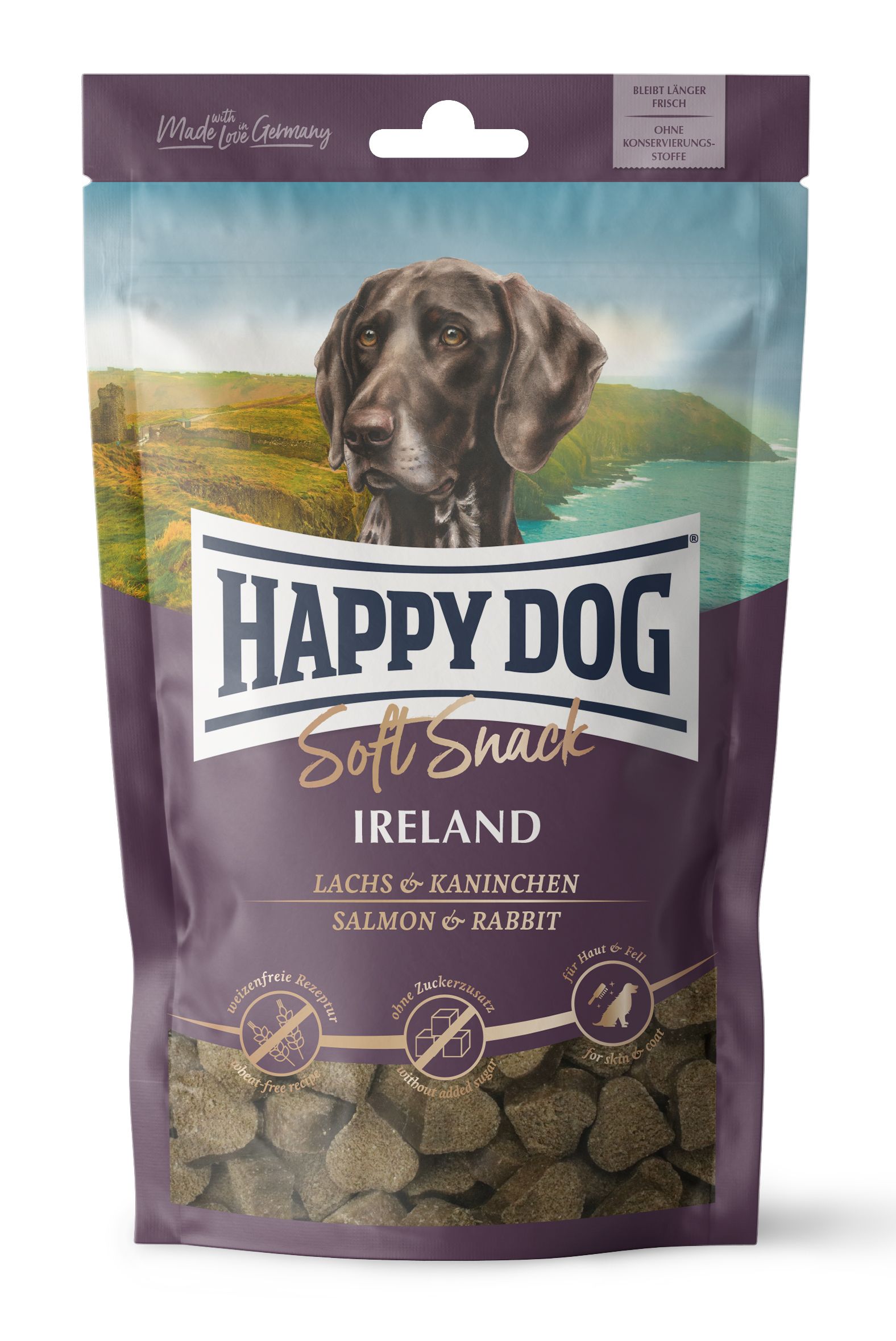 Verpackung von Happy Dog Soft Snack Ireland. Enthält Lachs & Kaninchen. Aufschrift: ohne Zuckerzusatz, ohne Konservierungsstoffe, für Haut & Fell.