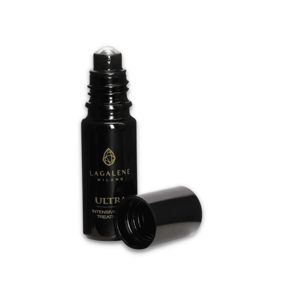 Eine schwarze Lagalene Milano Ultra Intensive Care Flasche mit Roll-on-Applikator. Der Deckel liegt daneben. Auf der Flasche steht "ULTRA INTENSIVE TREATMENT".