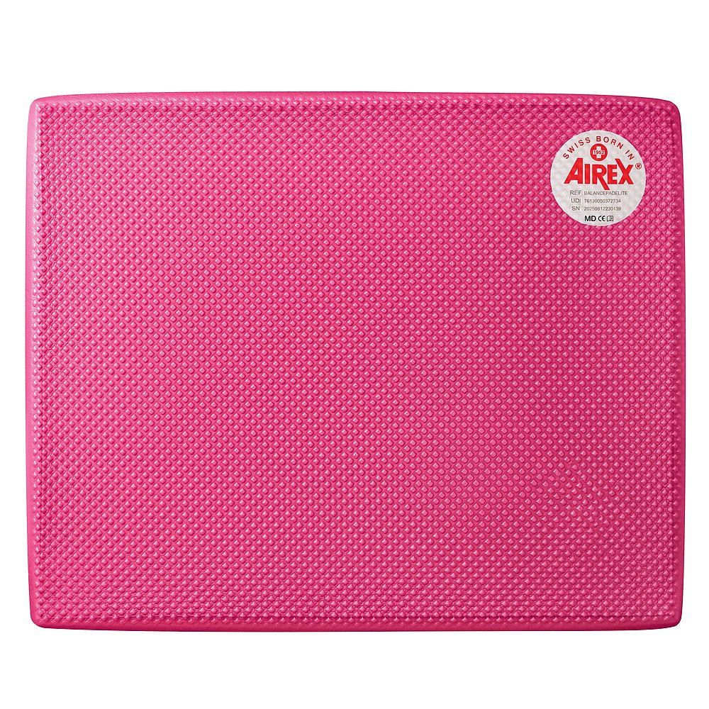 Rosa Balance-Pad Elite. Rechteckig, strukturiert, mit abgerundeten Kanten. Airex-Logo rechts oben.