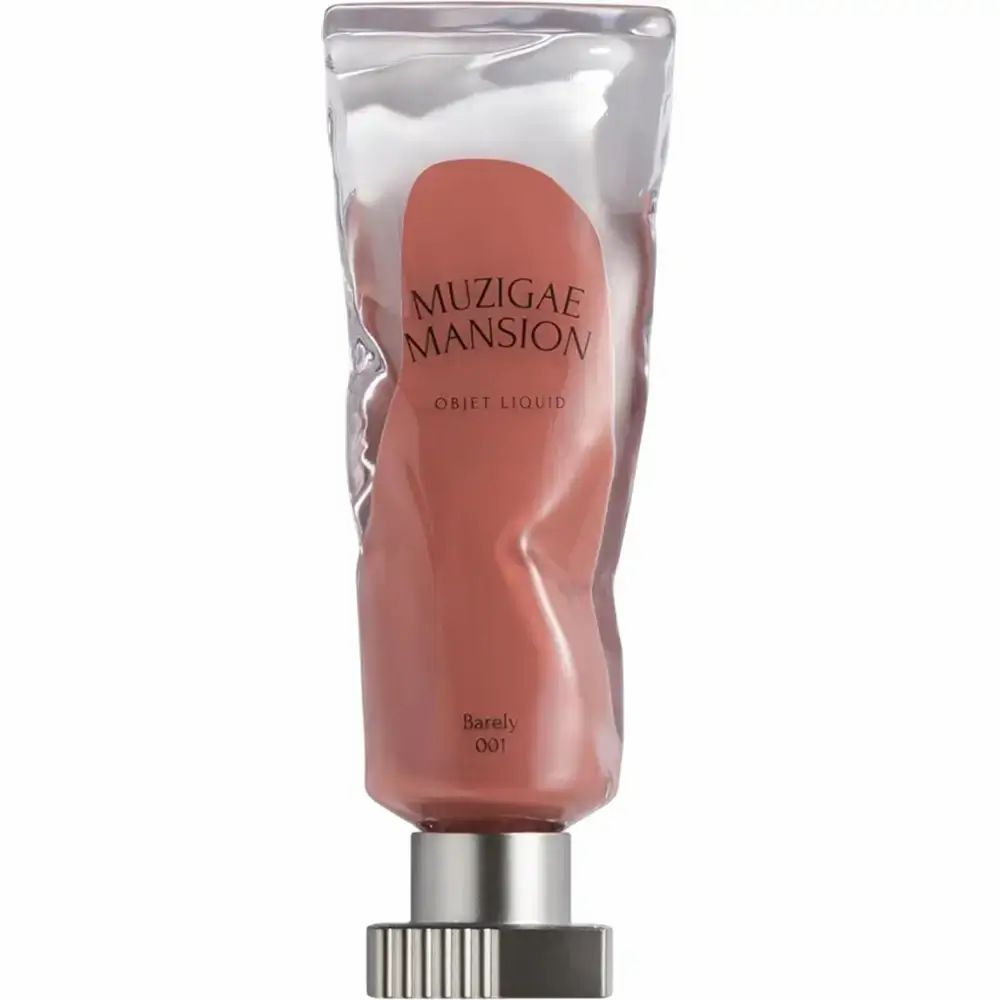 Flüssiger Lippenstift in einer transparenten Tube. Aufgedruckt: MUZIGAE MANSION Objet Liquid. Farbton: Barely 001.