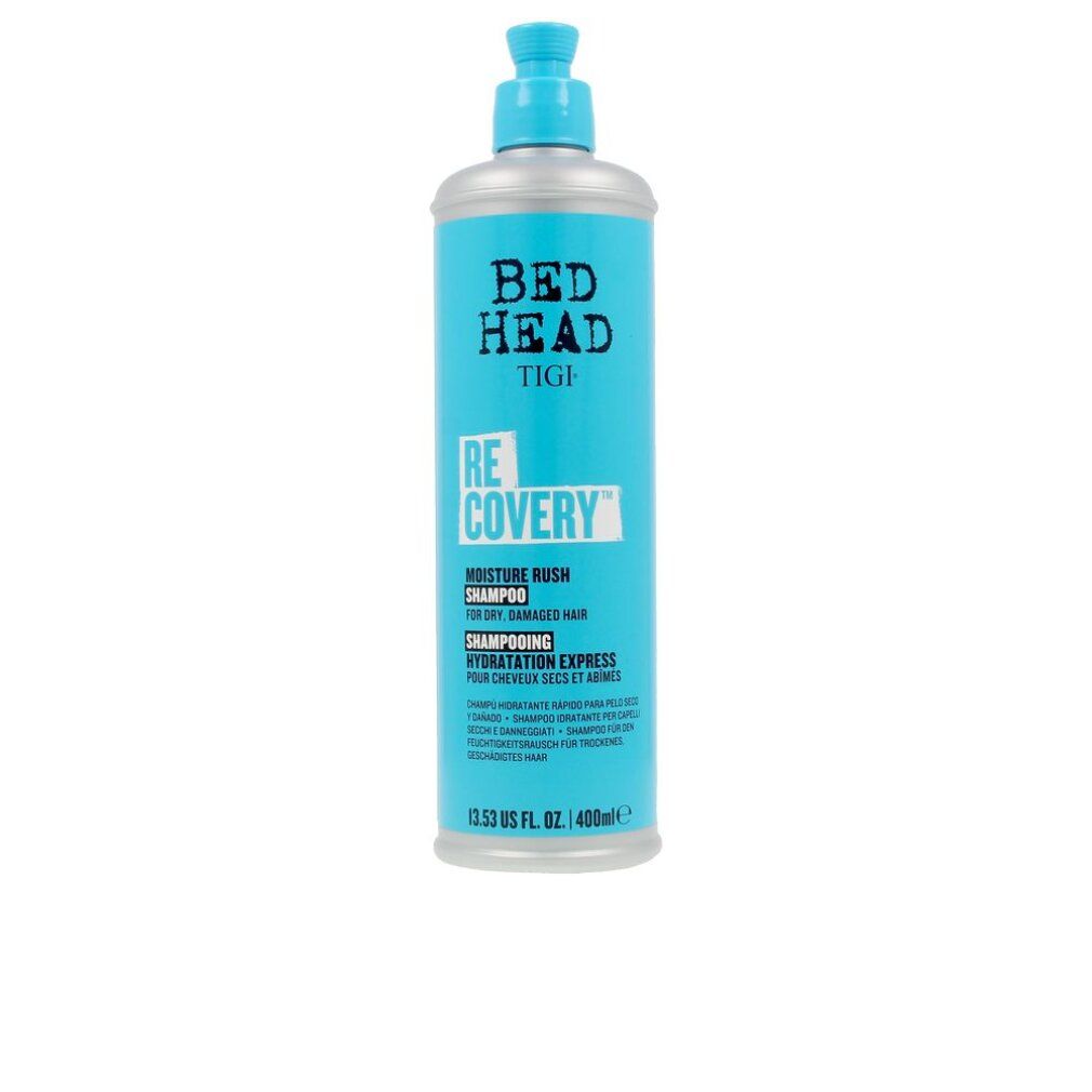 Türkis-farbene Shampoo-Flasche mit blauem Pumpkopf. Aufschrift: BED HEAD TIGI RECOVERY MOISTURE RUSH SHAMPOO.