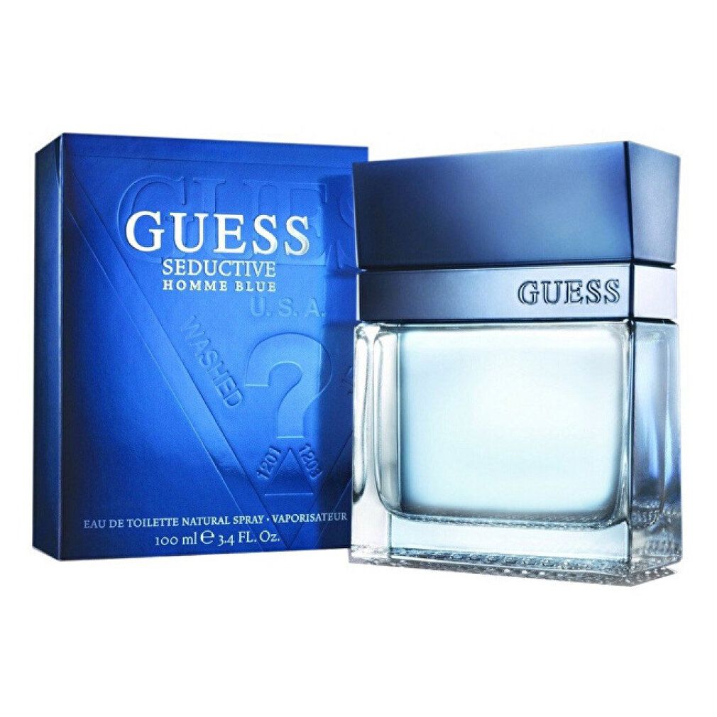 Blaues Parfümflakon und Schachtel. Aufschrift "GUESS Seductive Homme Blue". Flakon rechteckig, blaue Flüssigkeit. Schachtel blau.