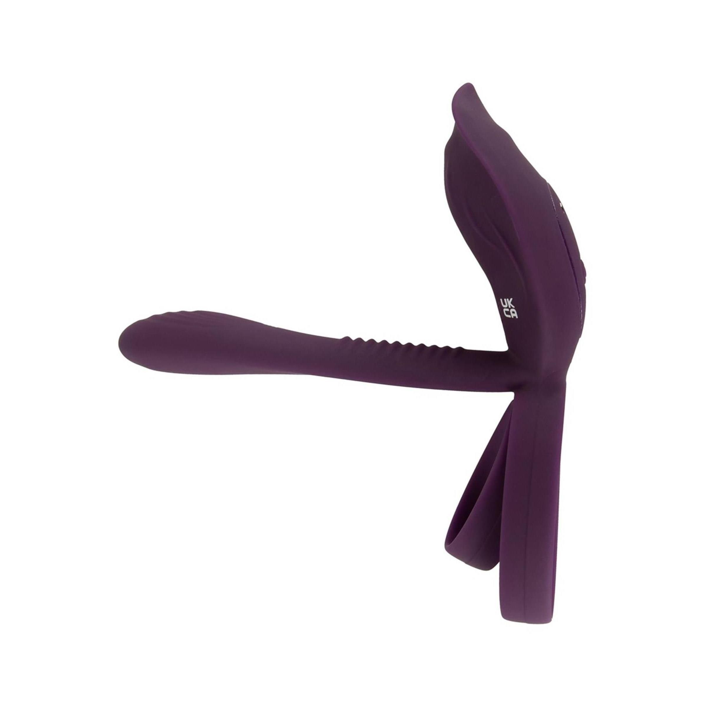 Lila Vibrator mit Ring. Seitliche Ansicht. UKCA-Kennzeichnung.