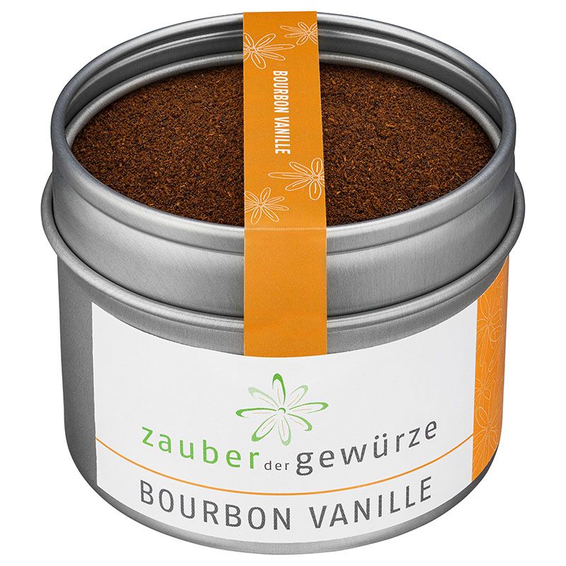 Metallbehälter mit gemahlener Bourbon-Vanille. Aufkleber mit "Zauber der Gewürze" und "Bourbon Vanille". Orangefarbener Streifen mit Text.