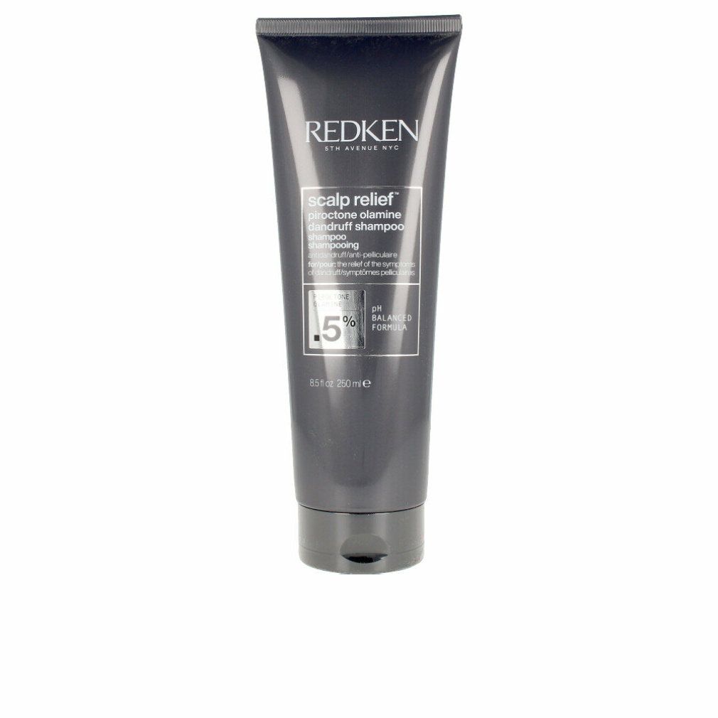 Dunkelgraue Tube. Text: Redken, Scalp Relief, Piroctone Olamine, Anti-Schuppen Shampoo. 0,5% Piroctone Olamine.