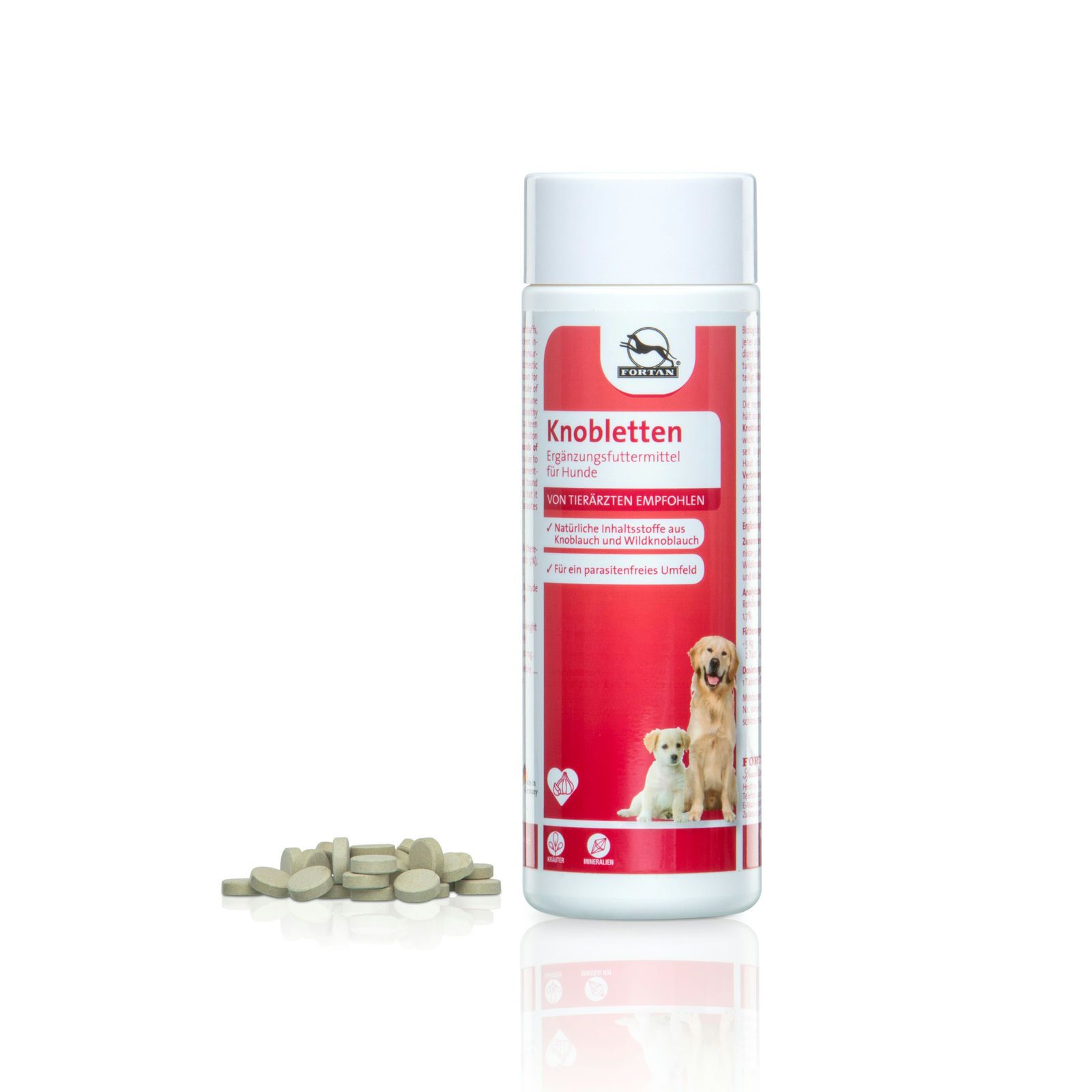 Weiße Flasche mit rotem Etikett und Tabletten daneben. Aufschrift: FORTAN Knobletten. Abbildung von zwei Hunden.