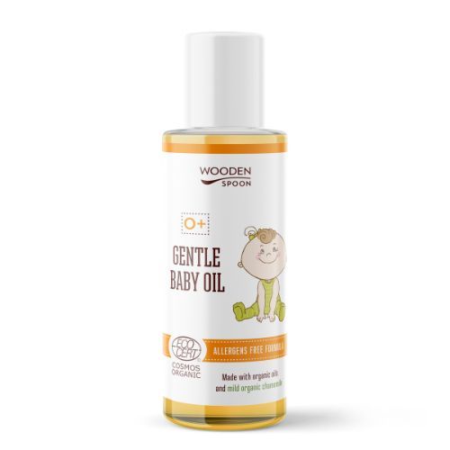Babyöl-Flasche mit weißem Deckel und gelbem Etikett. Aufschrift: Gentle Baby Oil, Wooden Spoon, Cosmos Organic.