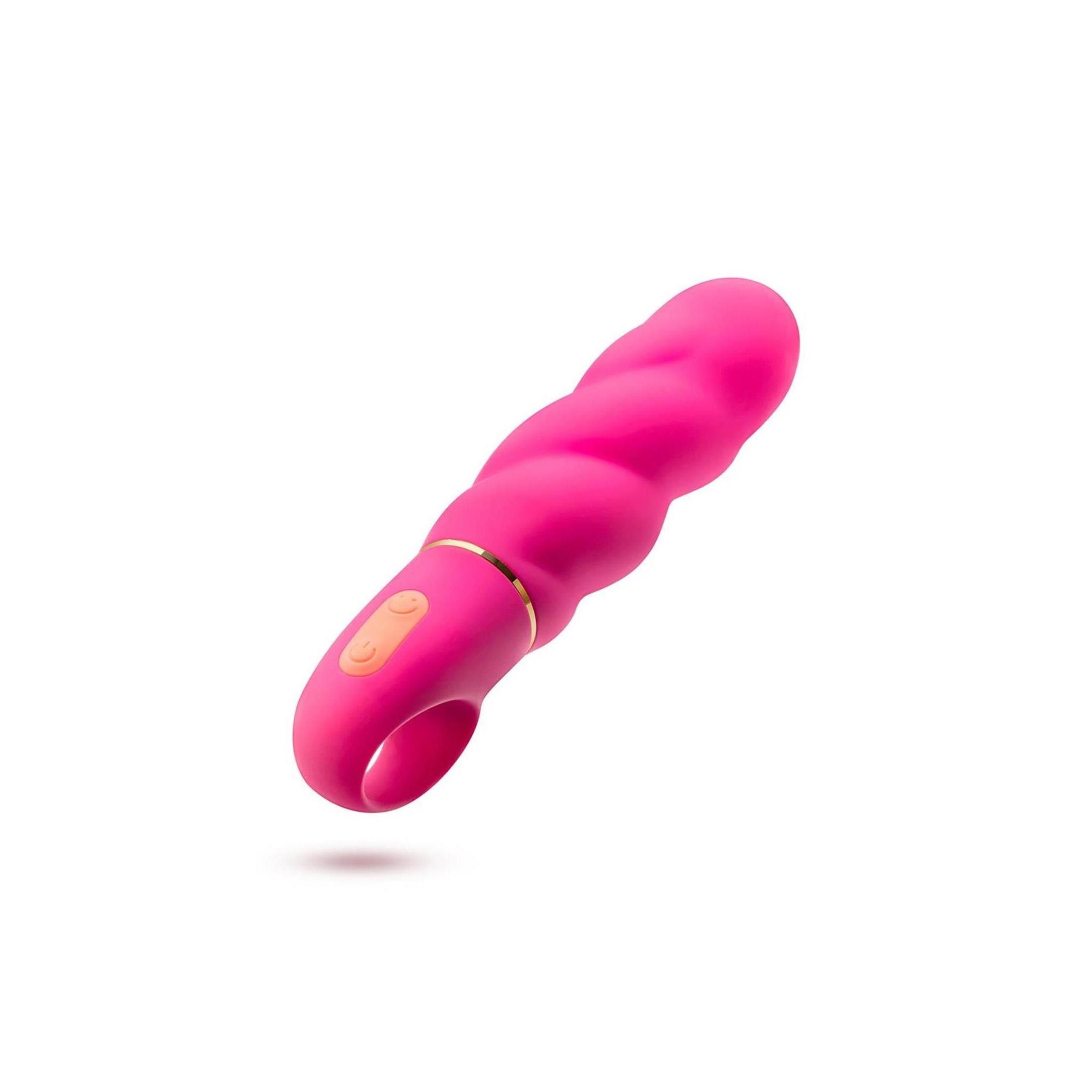 Pinkfarbenes Wellness-Produkt mit geriffelter Oberfläche und Ring. Goldfarbene Akzente. Auf weißem Hintergrund.