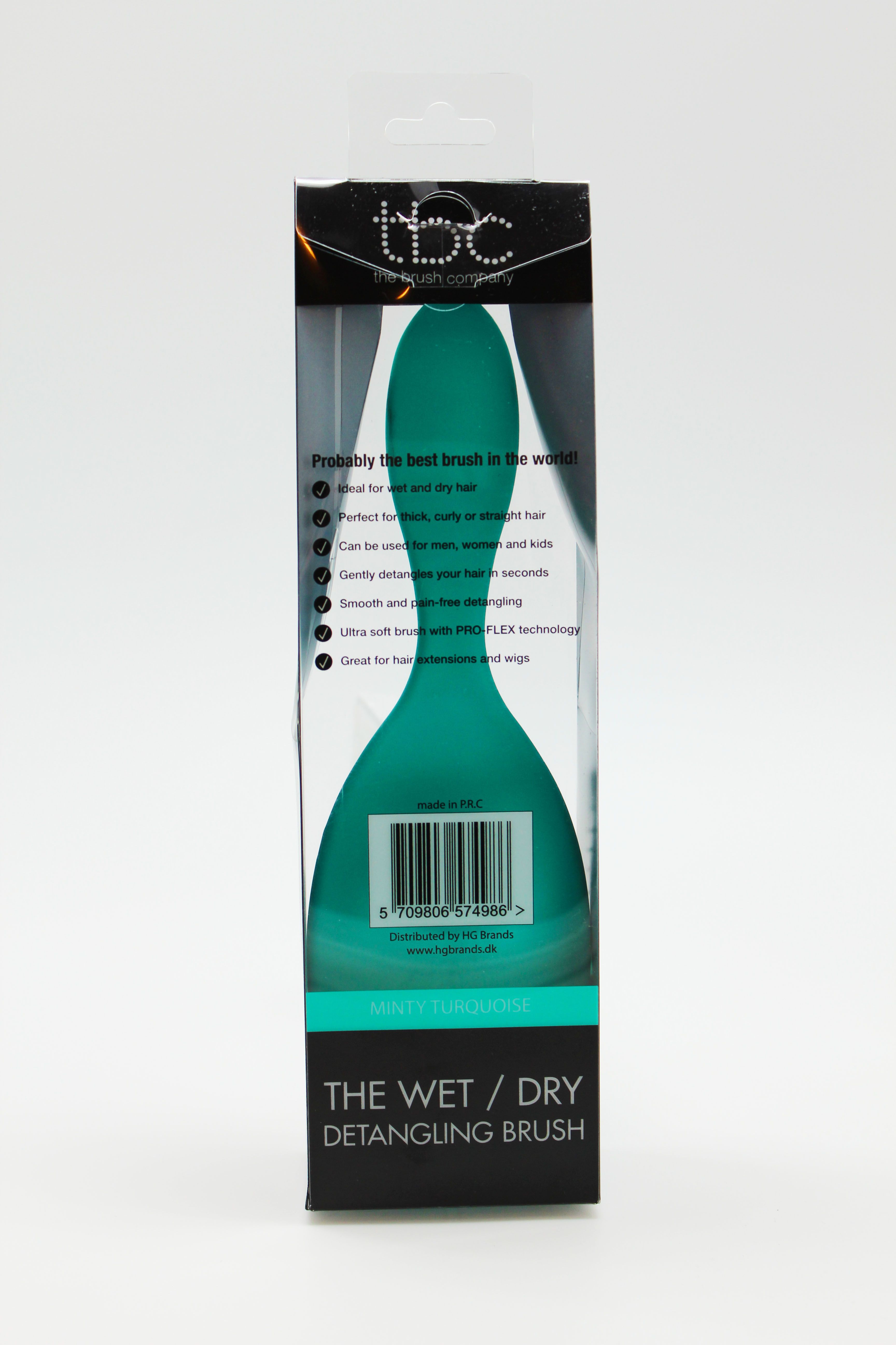 Rückseite der TBC Wet & Dry Haarbürste in Mintgrün-Türkis in Verpackung.