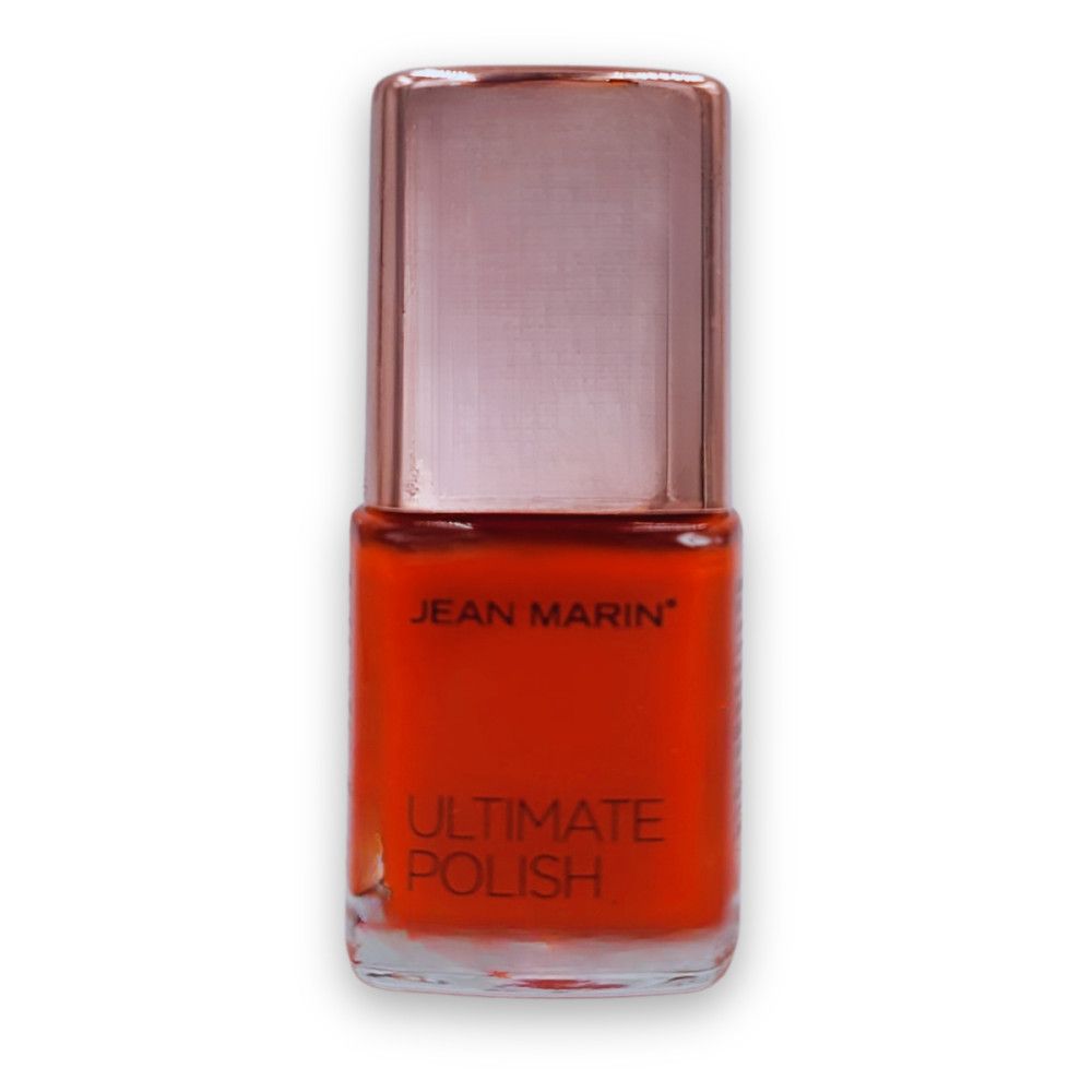Nagellackflasche mit roter Farbe. Jean Marin Ultimate Polish. Quadratische Glasflasche mit roségoldfarbenem Deckel.