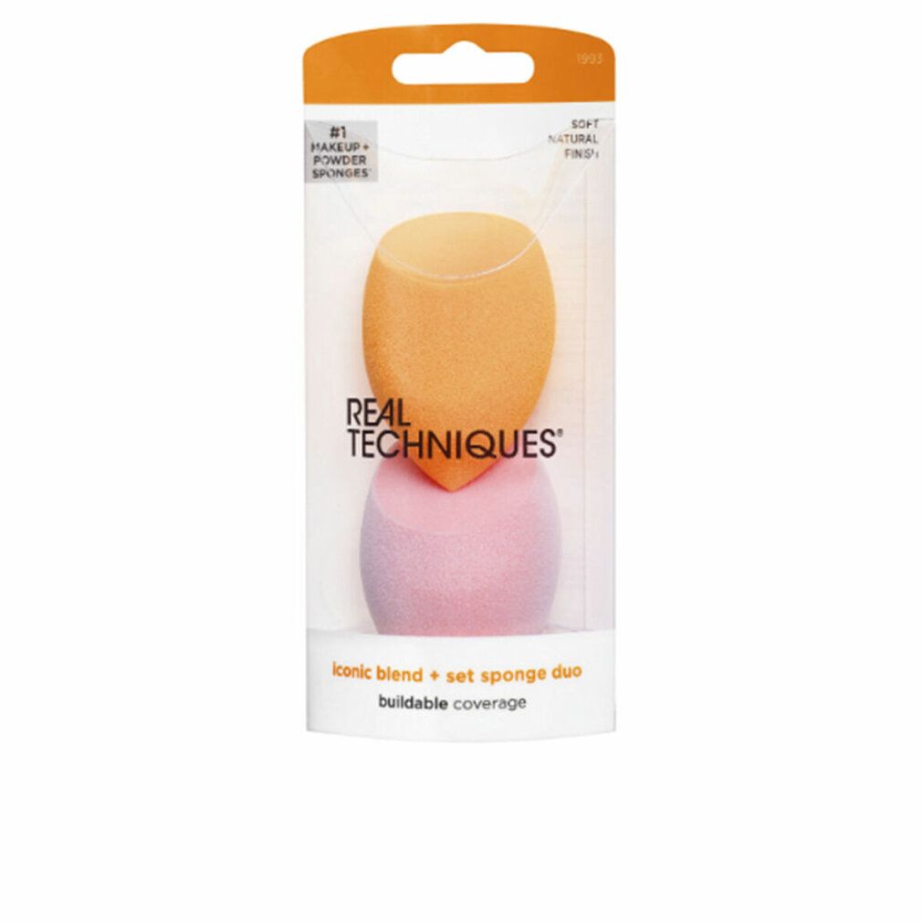 Zwei Make-up-Schwämme in einer Verpackung. Ein orangefarbener und ein rosafarbener Schwamm. Text: REAL TECHNIQUES, iconic blend + set sponge duo.