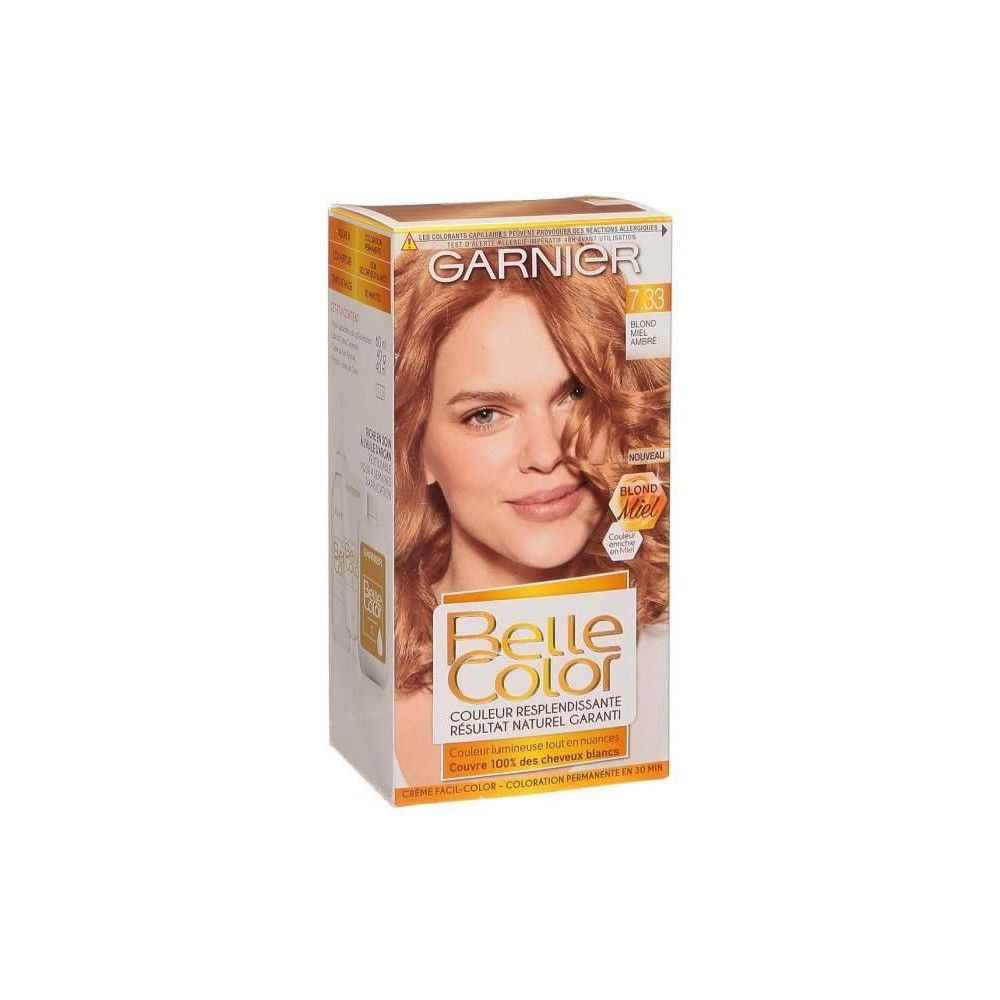 Garnier Belle Color Haarfarbe. Verpackung mit Frau. Text: 7.33 Blond Miel Ambré. Farbe für natürliches Ergebnis.