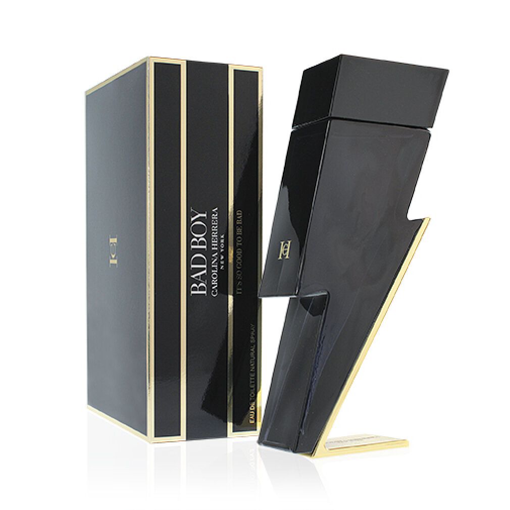 Schwarzer Flakon in Blitzform und schwarze Verpackung. Goldfarbene Schrift. Logo. Text: Bad Boy.