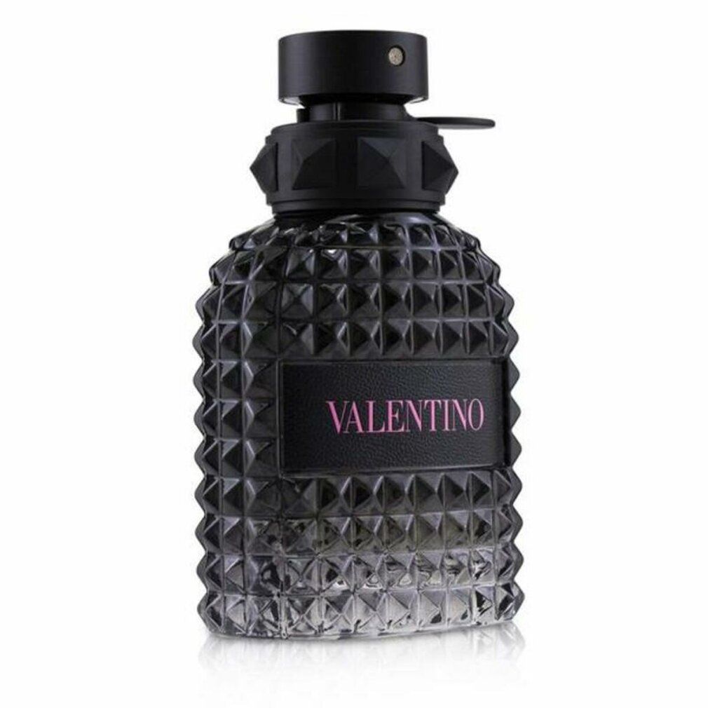 Schwarze Valentino-Parfümflasche. Flasche mit pyramidenförmigem Muster. Produktname: Valentino.