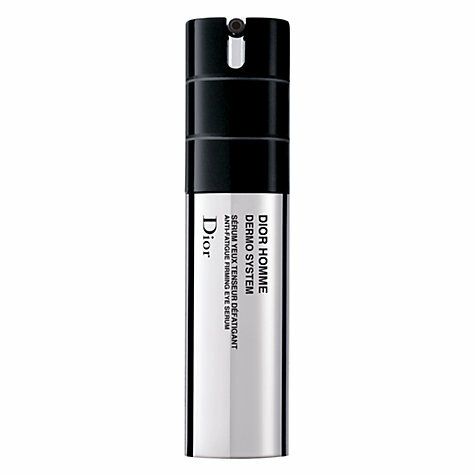 Serumflasche. Aufschrift: Dior Homme Dermo System. Text in Französisch und Englisch. Weiß, Schwarz und Silber.