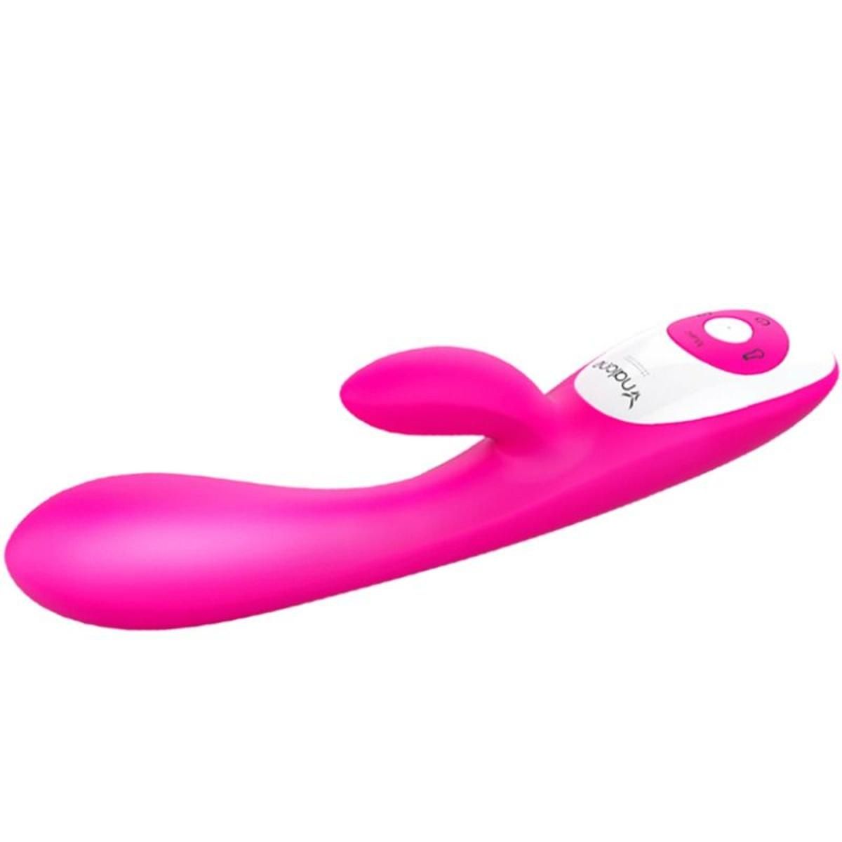 Pinkfarbener Vibrator mit zwei Aufsätzen. Der Griff hat eine weiße Steuerung mit Knöpfen. Auf dem Griff steht "nalone".