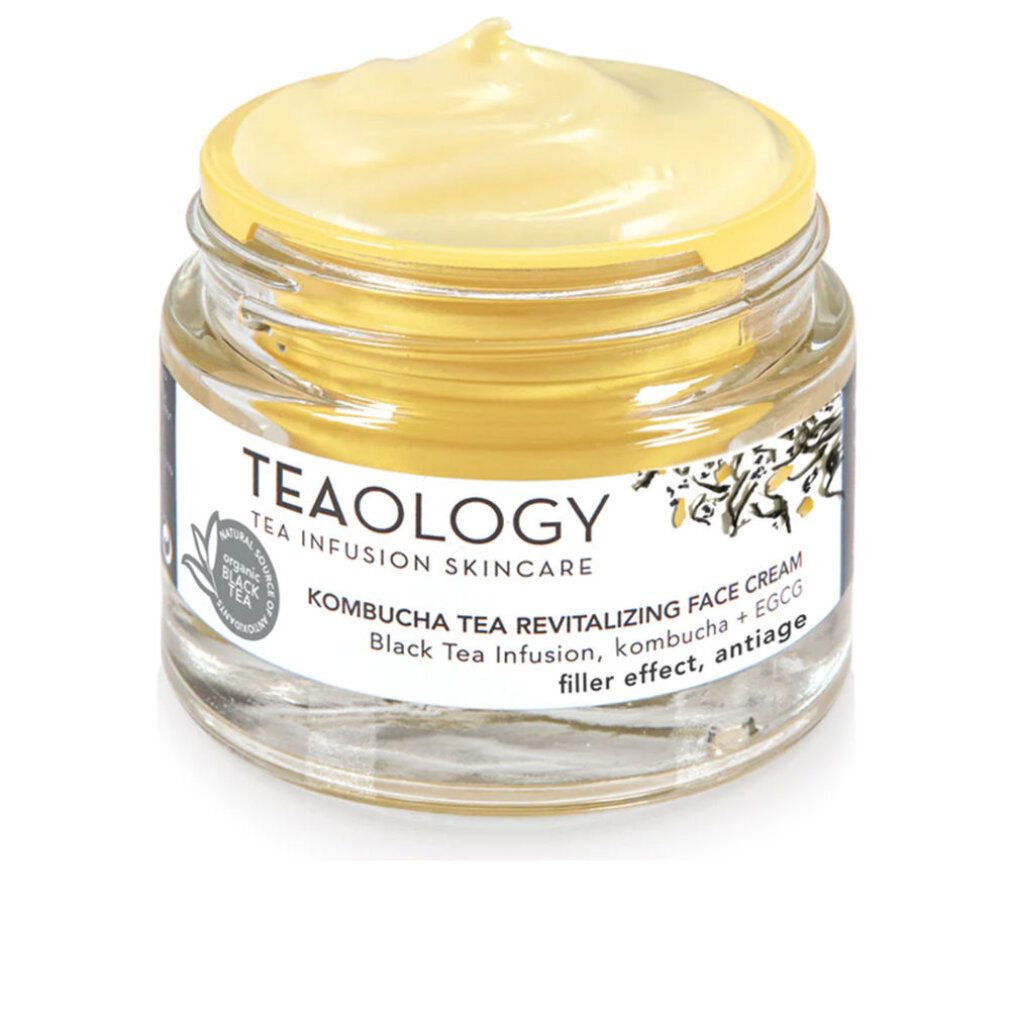 Glasbehälter mit gelblicher Creme. Aufschrift: Teaology, Kombucha Tea Revitalizing Face Cream.