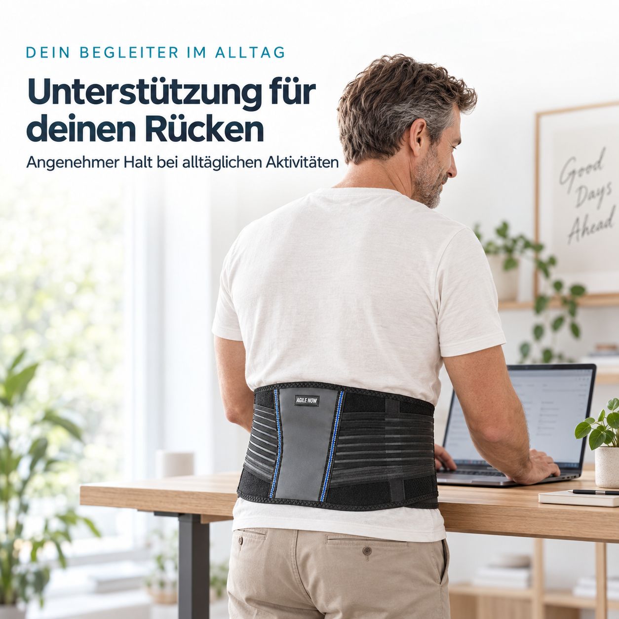 Mann am Schreibtisch trägt AGILE NOW Rückenstützgürtel für tägliche Unterstützung. Atmungsaktives Material.