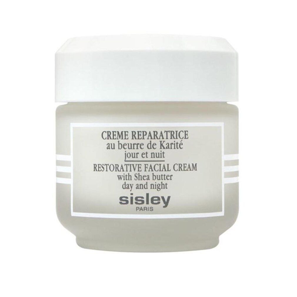 Creme Reparatrice-Gesichtscreme mit Sheabutter. Weißes Glas mit weißem Deckel. Text: Sisley, Creme Reparatrice, Restorative Facial Cream.