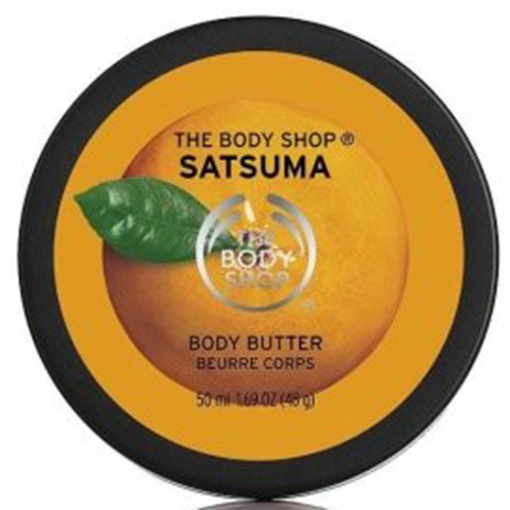 Körperbutter-Dose mit schwarzem Deckel. Orangefarbenes Design mit Blatt. Aufschrift: Satsuma, Body Butter, The Body Shop.