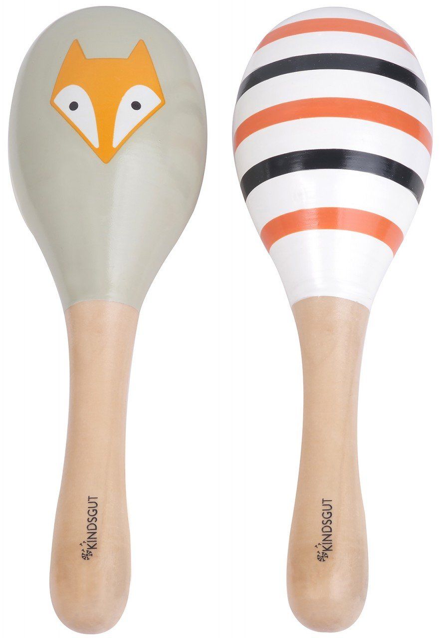 Zwei Rasseln mit Holzgriff. Eine grau mit Fuchsmotiv, die andere weiß mit Streifen in Schwarz und Orange. Kindsgut-Logo.