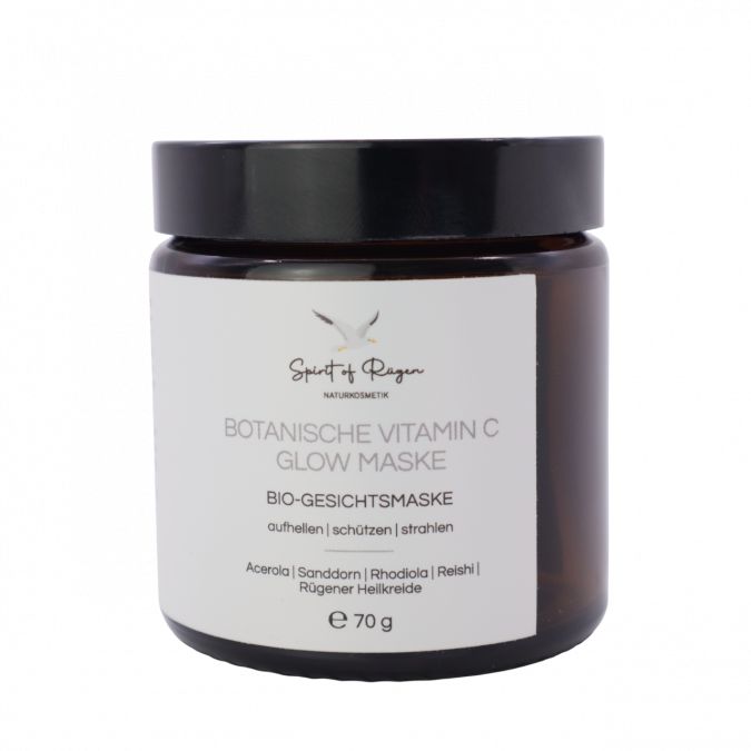Braunes Glas mit schwarzem Deckel. Etikett mit Text: Botanische Vitamin C Glow Maske, Bio-Gesichtsmaske, 70 g.