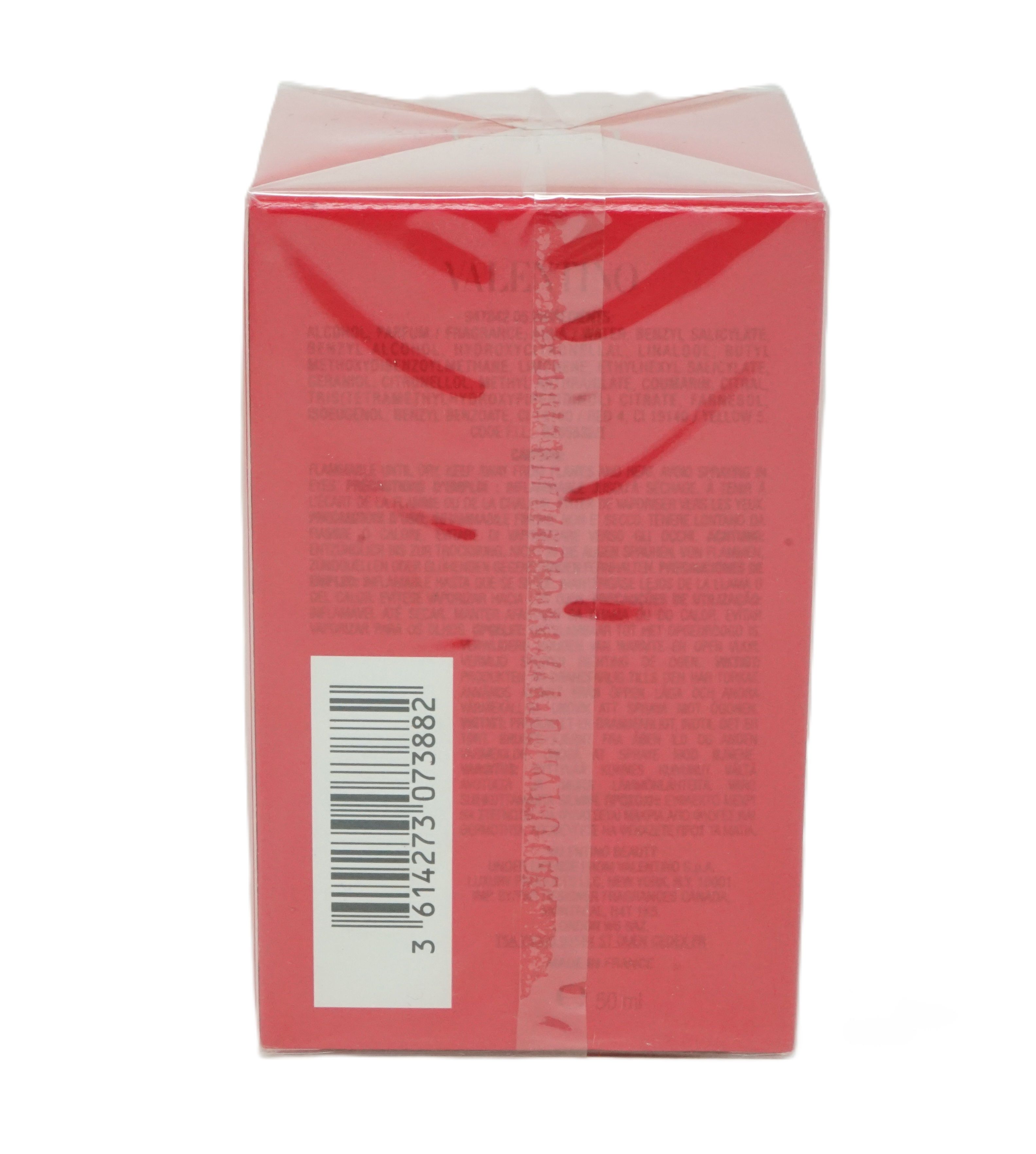 Rote Verpackung, Rückseite mit Barcode und Text. In Folie verpackt.