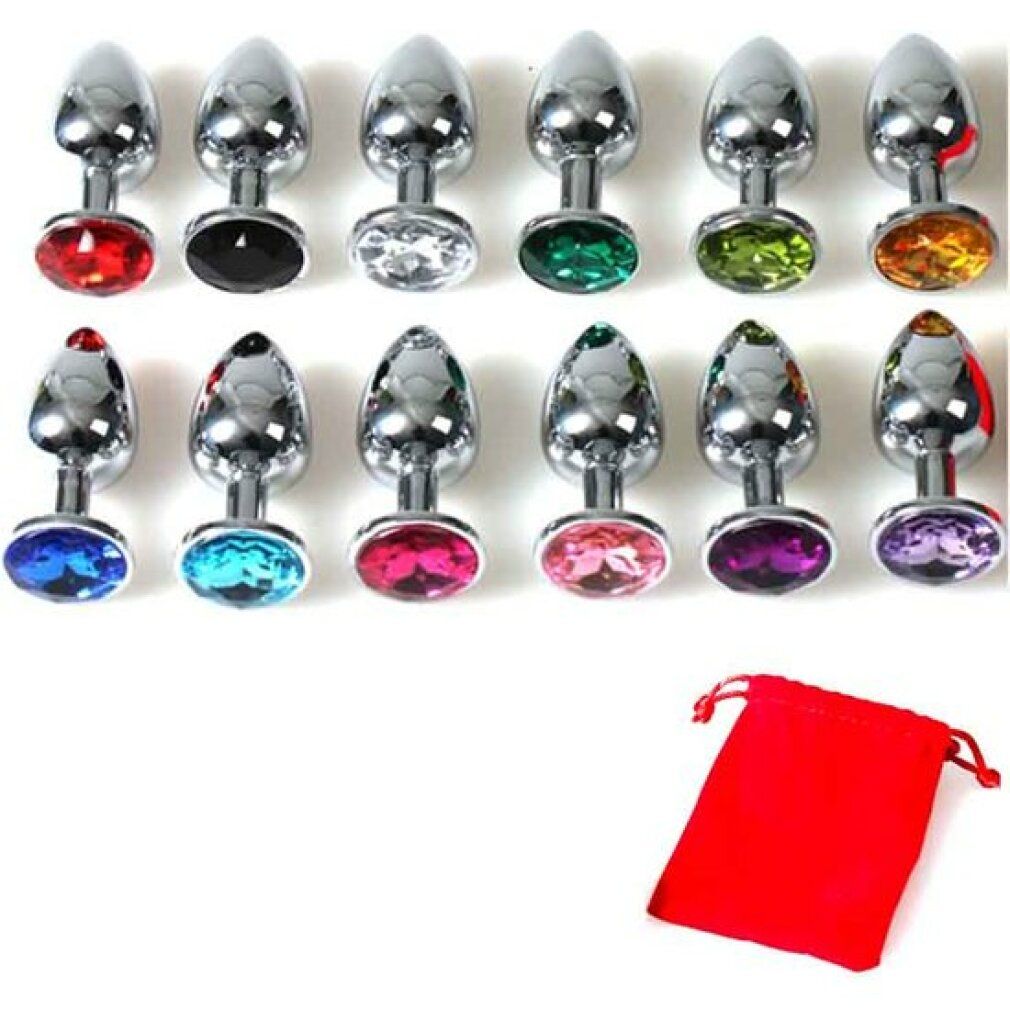 Mehrere Analplugs mit farbigen Schmucksteinen. Metall, glänzend. Inklusive rotem Beutel.