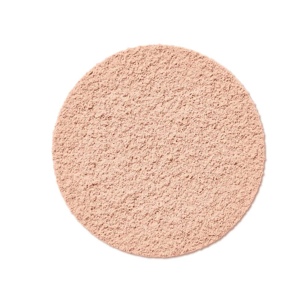 Runde, beige Puderfläche. Feine Textur. Auf weißem Hintergrund.
