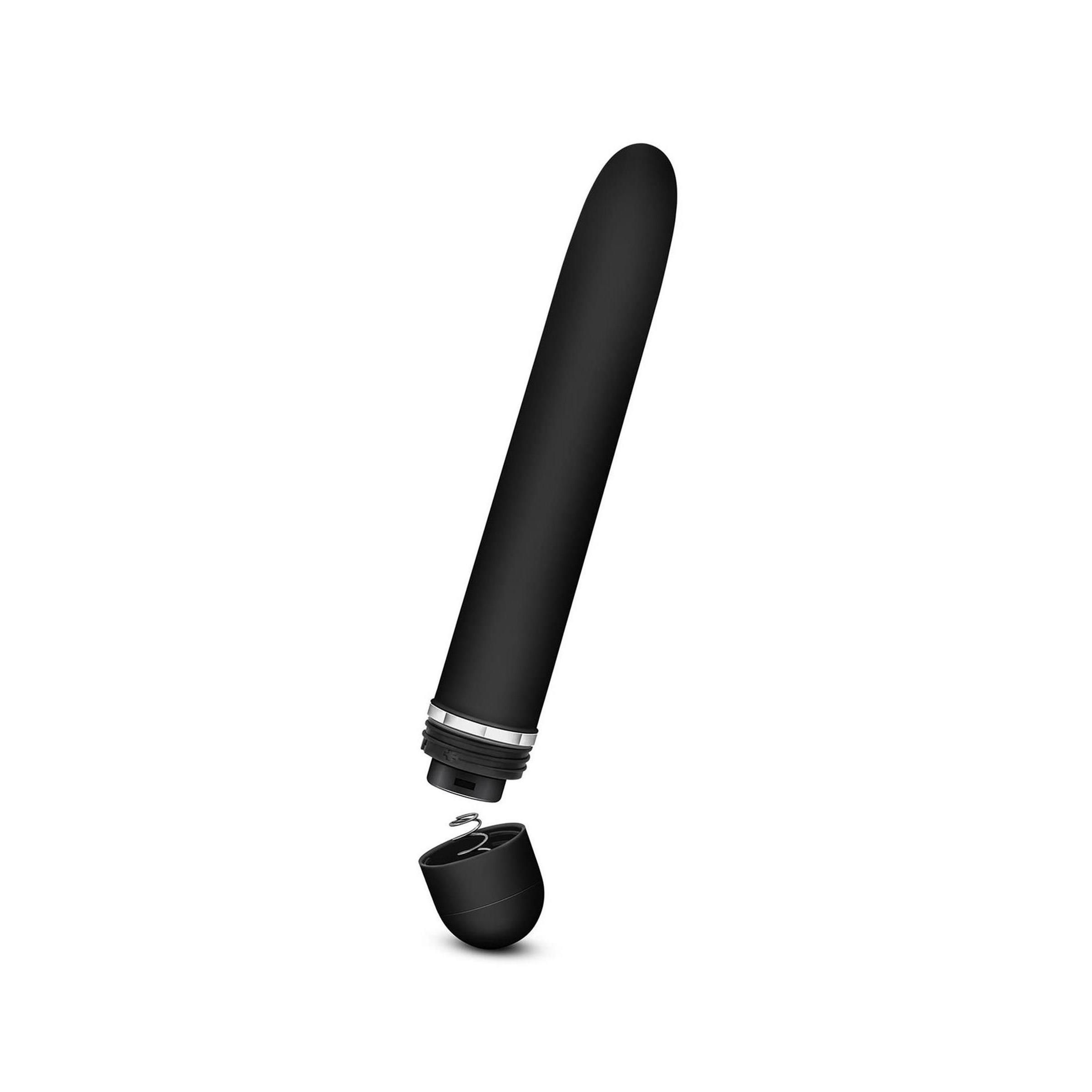 Schwarzer Vibrator, zerlegt. Kopf abgenommen, zeigt Innenraum. Auf weißem Hintergrund.