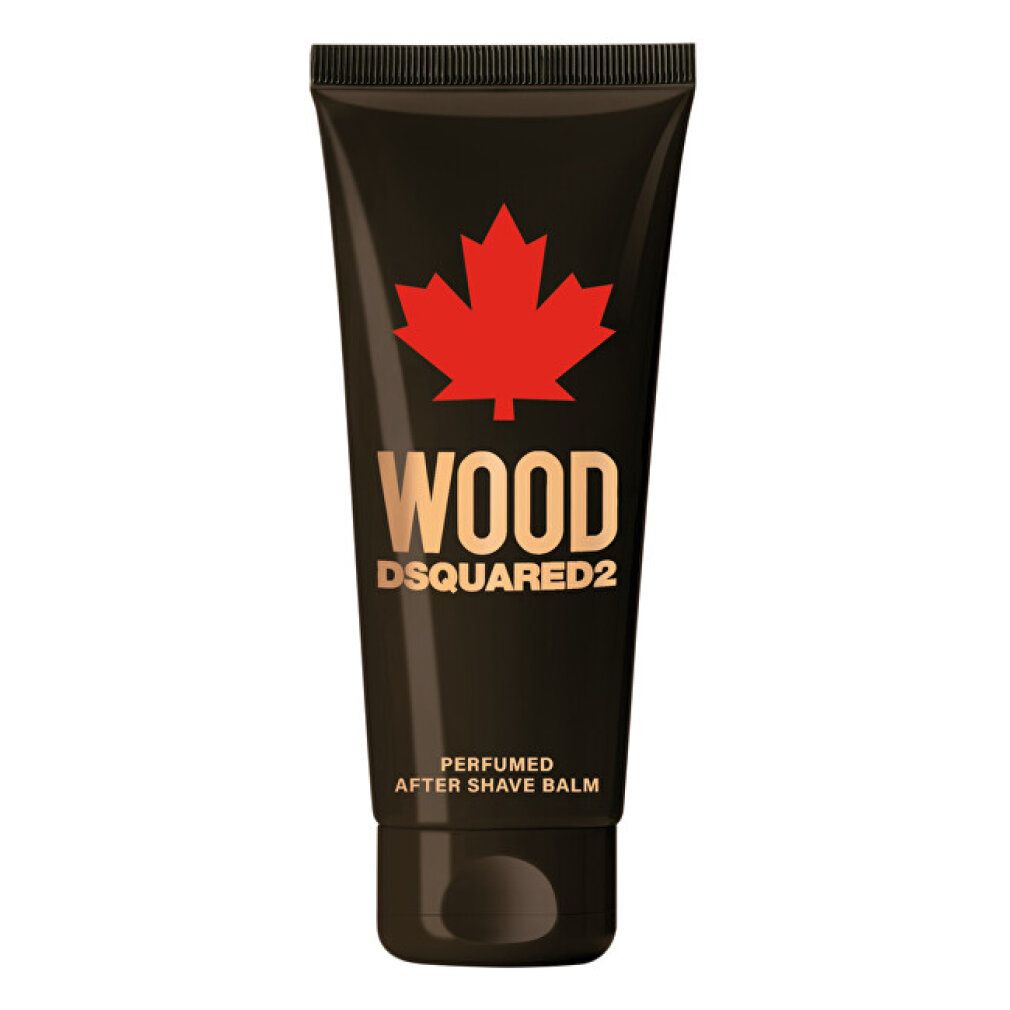 Dunkle Tube mit rotem Ahornblatt-Logo und goldener Schrift "WOOD DSQUARED2". Darunter "PERFUMED AFTER SHAVE BALM".