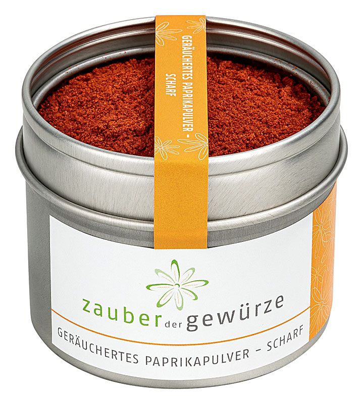 Runde Dose mit Paprikapulver. Aufkleber mit Produktname und Text. Orangefarbener Streifen mit Text. Deckel offen.