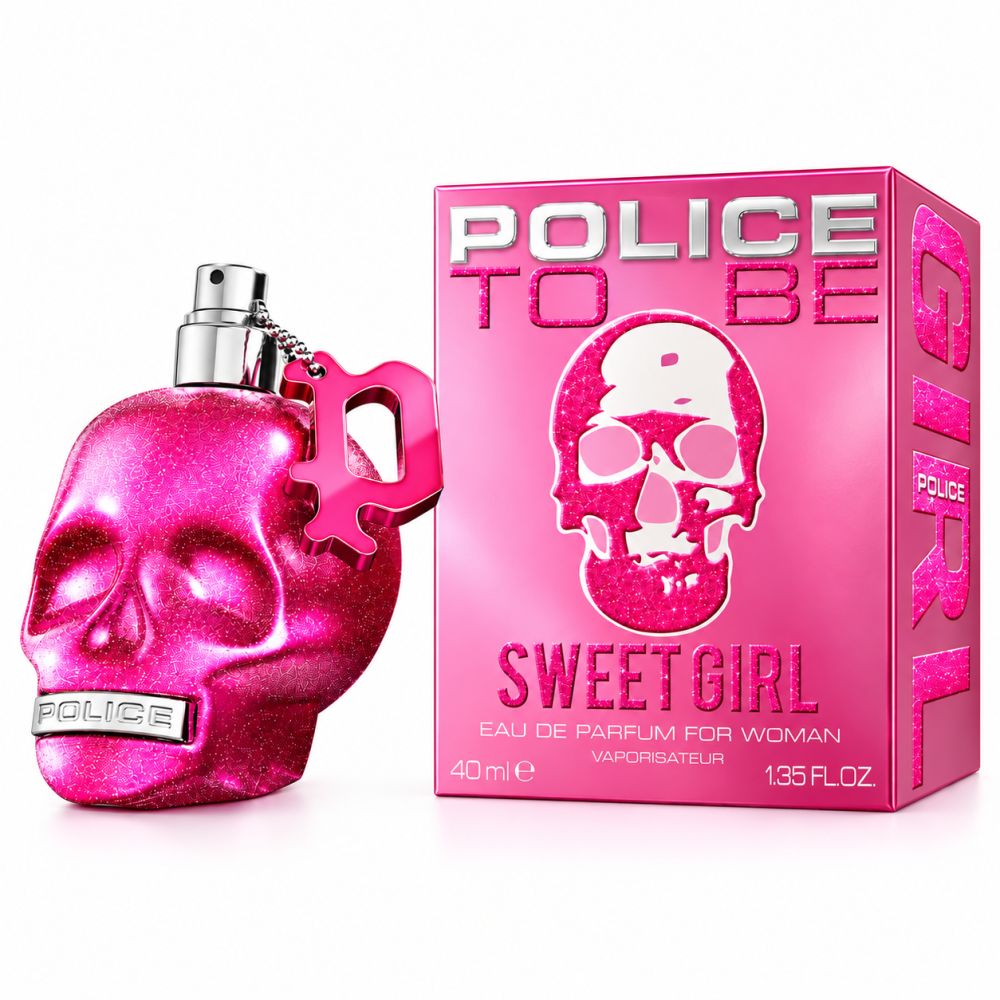 Glitzernde pinke Totenkopf-Parfümflasche mit passender Schachtel. "Sweet Girl" Aufschrift.