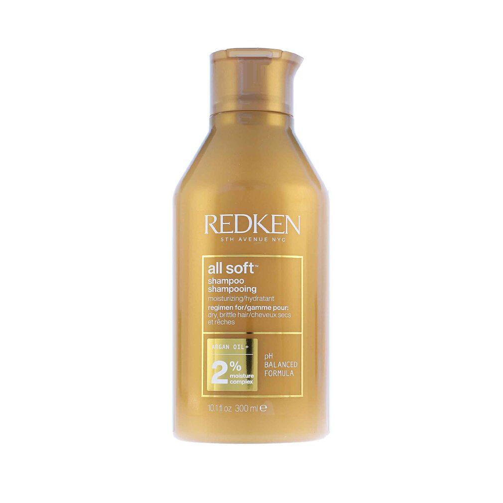 Goldfarbene Shampoo-Flasche. Aufschrift: Redken, all soft shampoo. Enthält Arganöl und 2% Feuchtigkeitskomplex. pH-ausgewogene Formel.