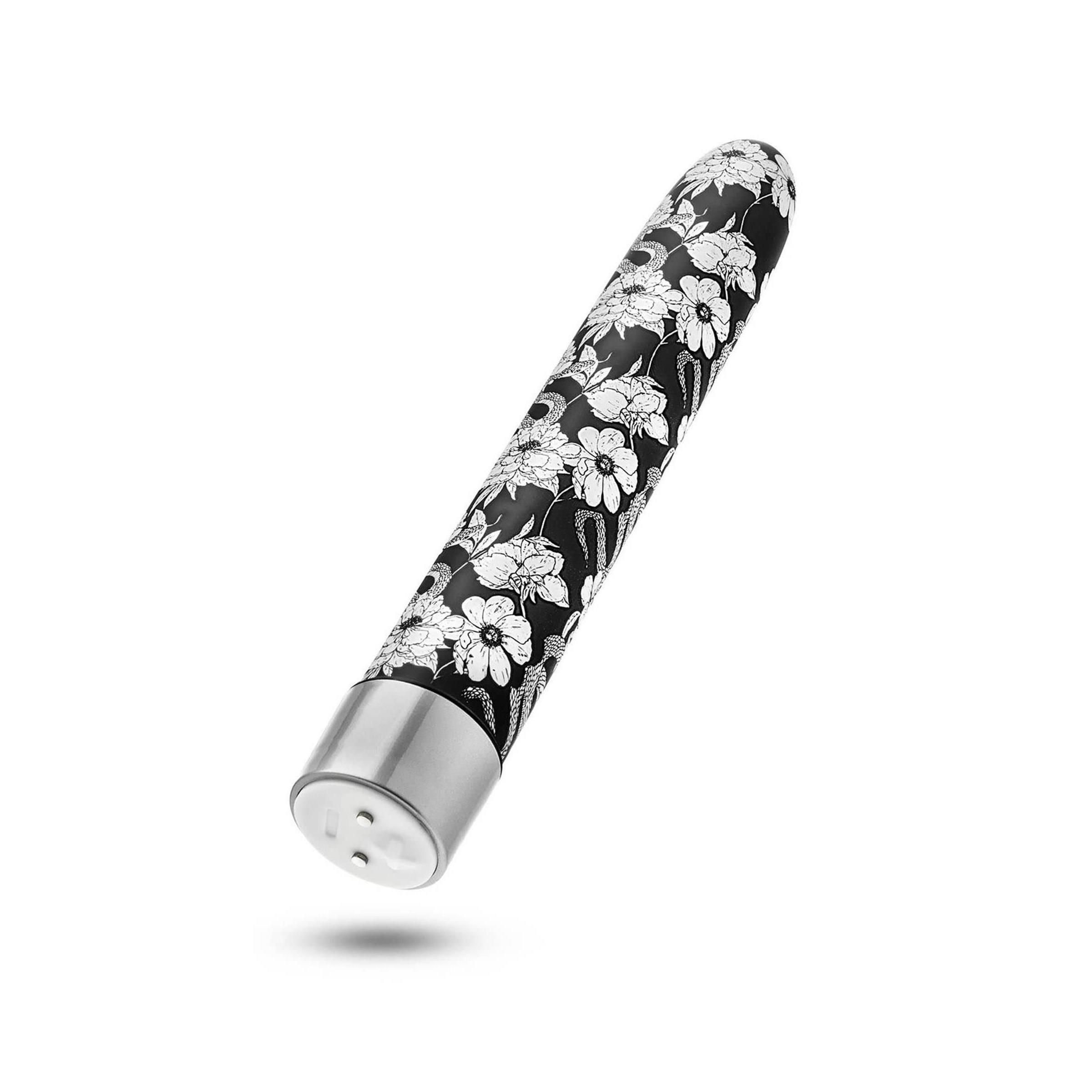 Wellness-Produkt mit Blumenmuster. Schwarzer Hintergrund, silberfarbener Abschluss. Perspektivische Ansicht.